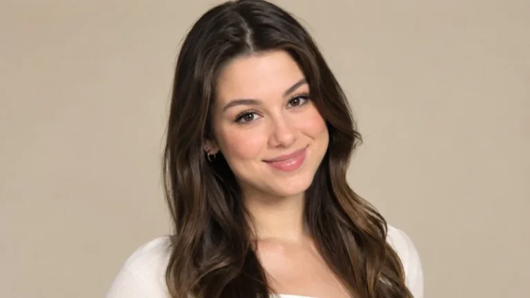 Kira Kosarin smiling in a studio portrait